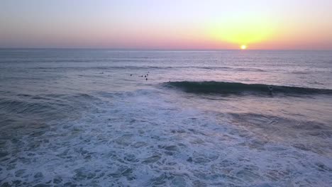 why do all surfers always meet in the water at sunset