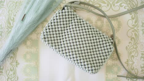 sage green beaded bag