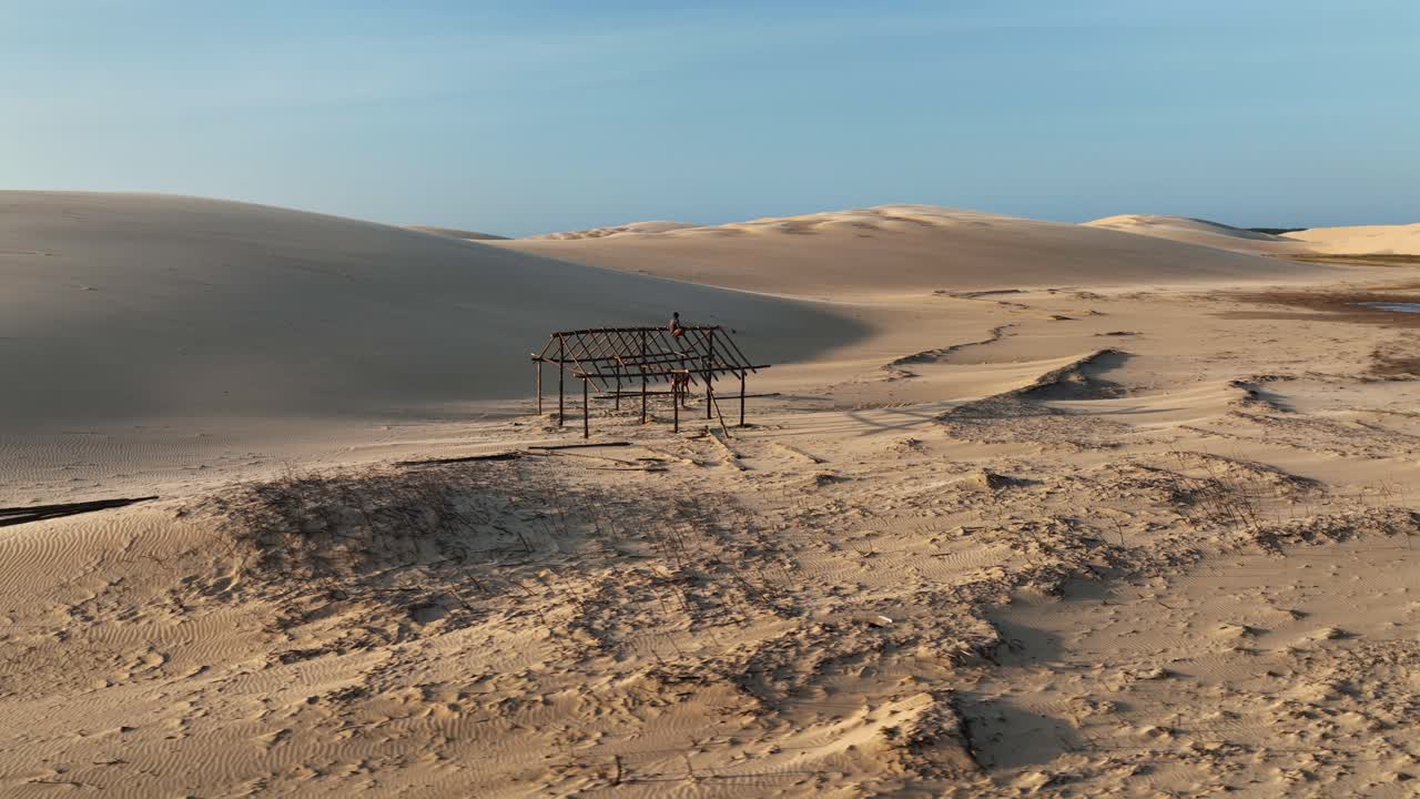 Native People Building A Wooden Hut Amidst The Sand Deserts Of Parnaíba River Delta In Brazil. Aerial Drone Shot