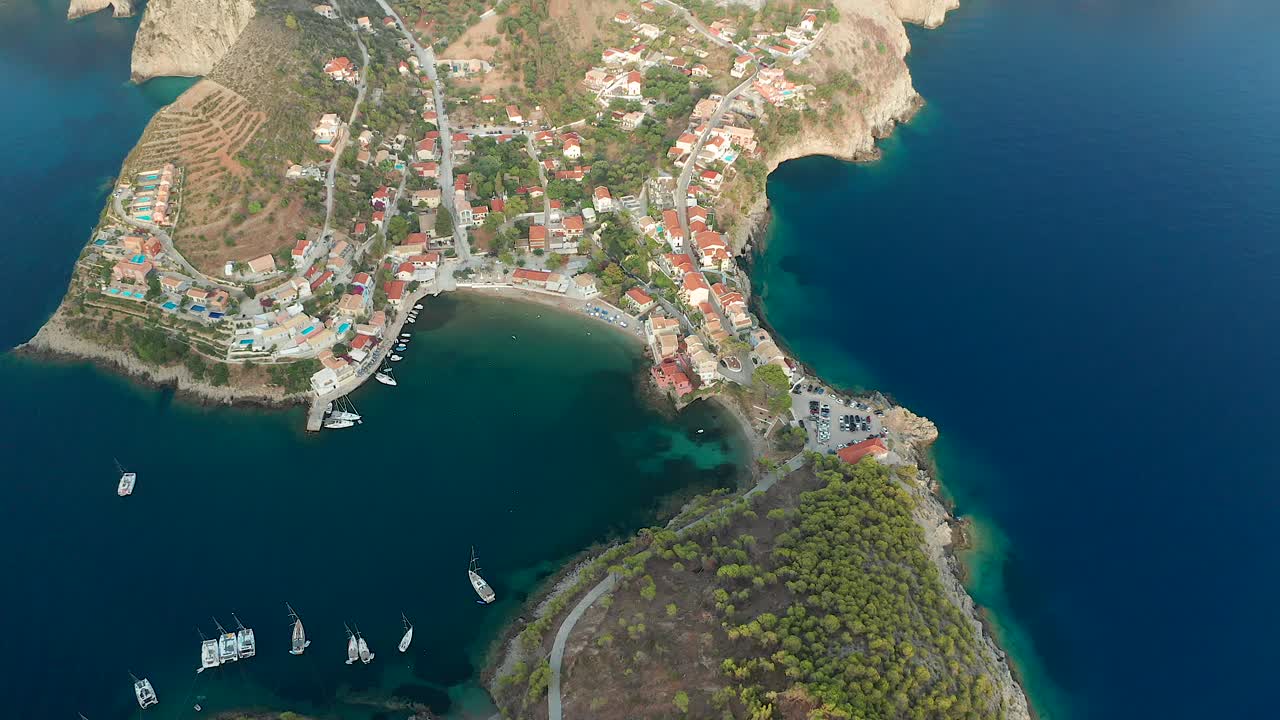 Top down view flyover Scenic Assos village, stunning shore Landscape, Kefalonia, Greece