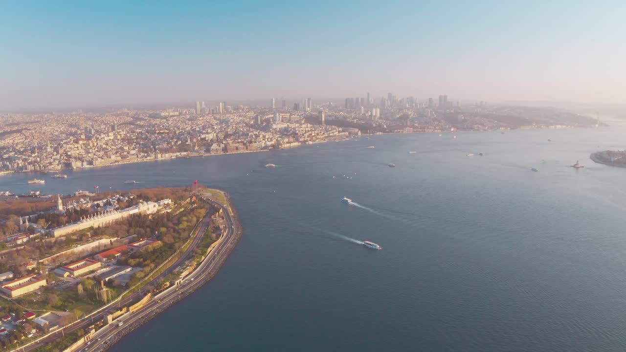 Drone video of Istanbul Turkey in the Sultanahmet area with touristic mosques (hagia Sophia, aya sofia, blue mosque and the bosphorus with a view to the European and Asean sides on a sunny morning.