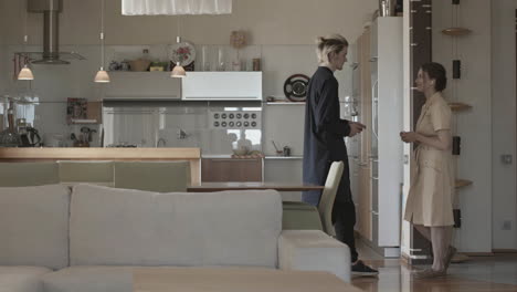 couple talking in a modern kitchen