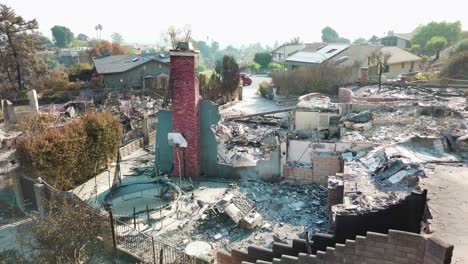 aerial over a hillside home destroyed by fire in ventura california following the thomas wildfire in 2017 4