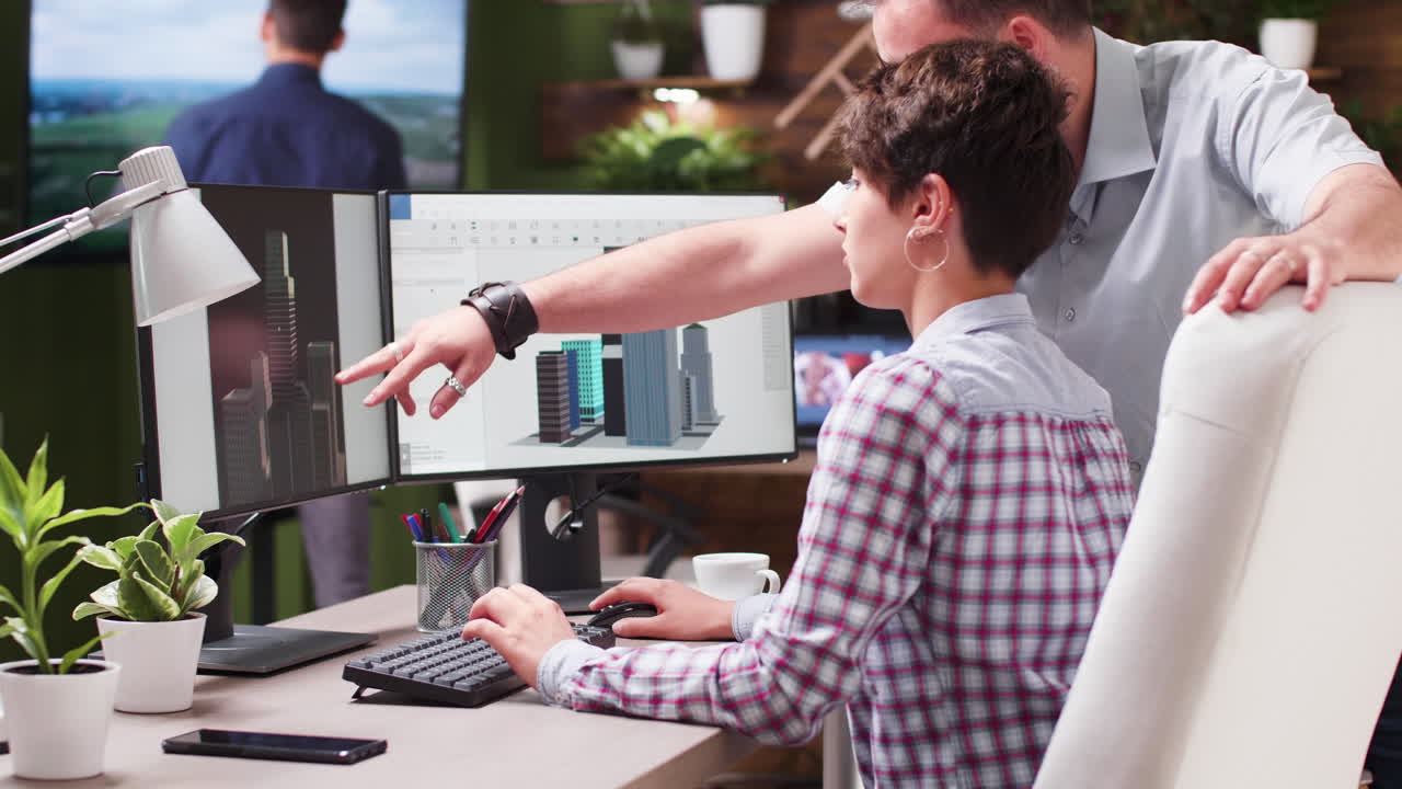 Architects collaborating on a building design in a modern office