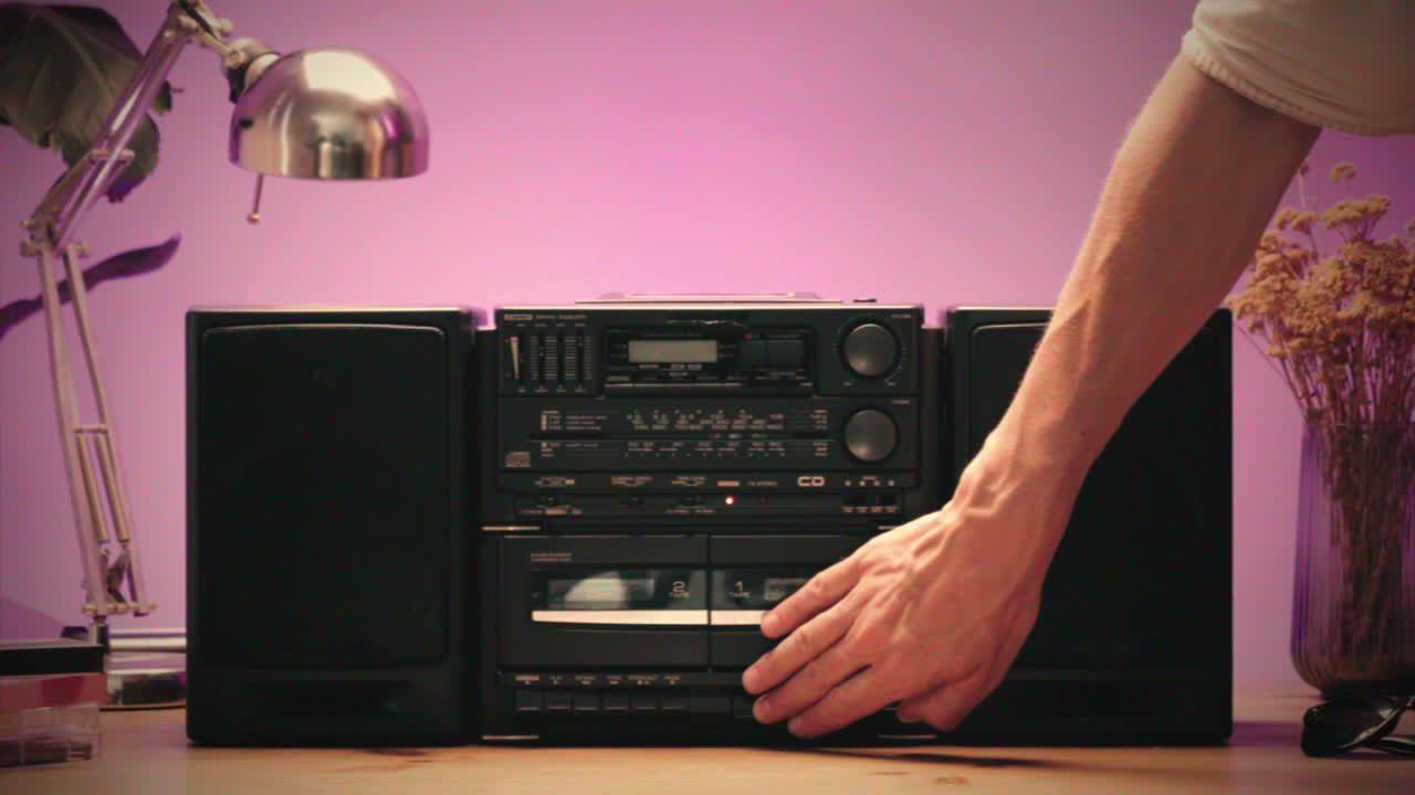 Retro radio tape recorder, audio cassette close-up. Listening to music, old radio boom box player, macro of vintage music listening. . High quality 4k footage