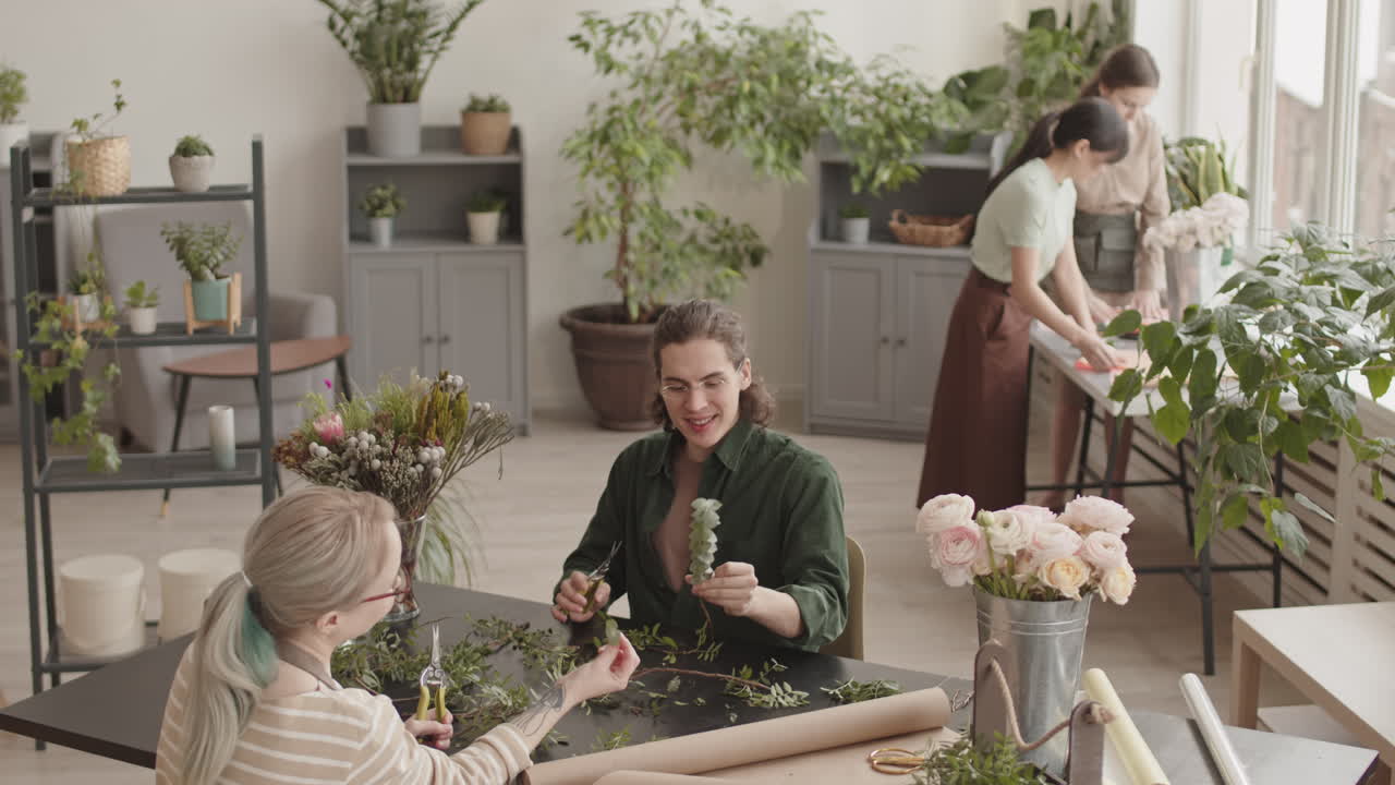 Florists working in a flower shop