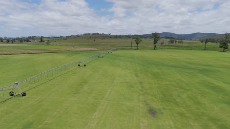 irrigation system watering expansive green turf fields