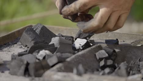 Slow-Motion-Shot-Of-Blacksmith-Preparing-Coal