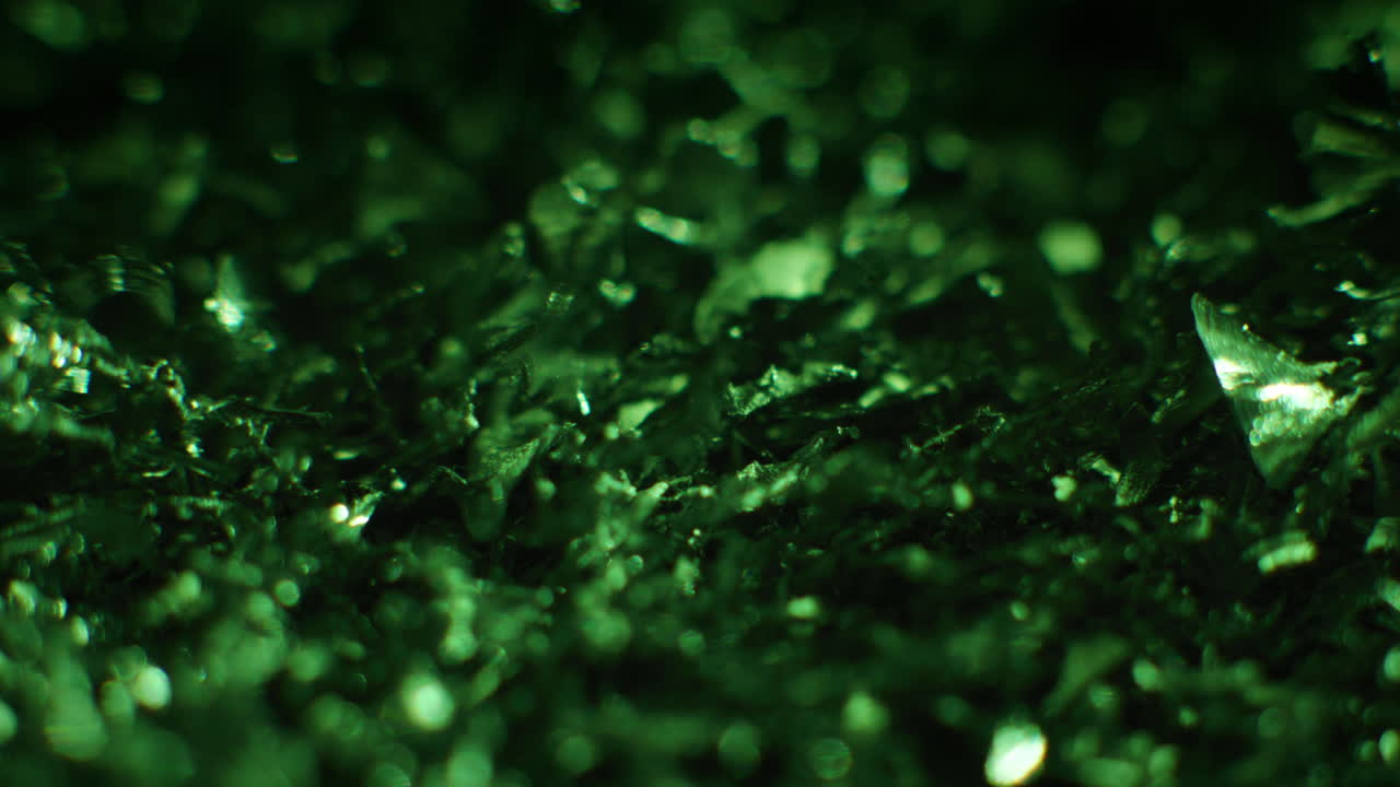 Emerald color metal fillings close-up shot