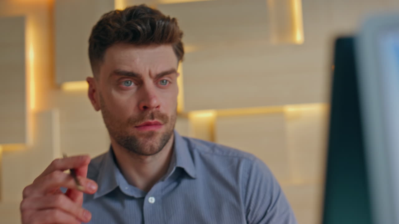 Professional designer looking samples on office close up. Serious man working