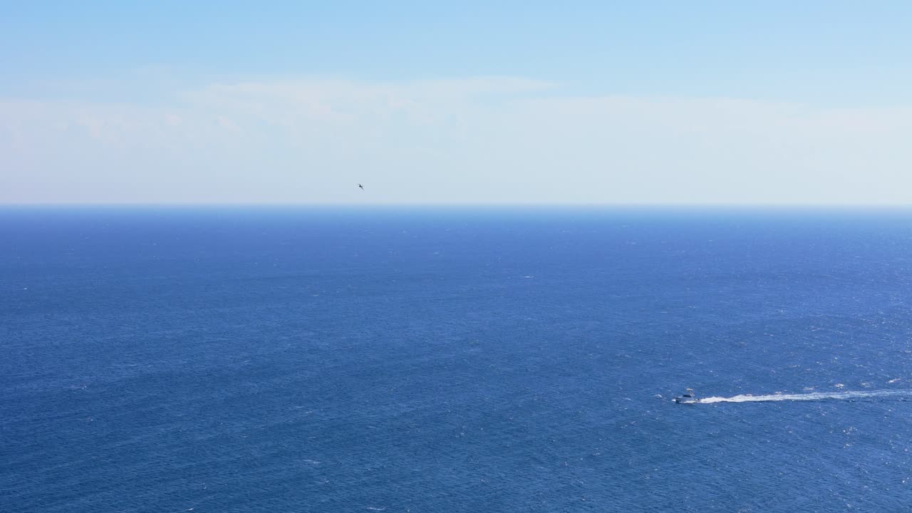 Beautiful Calm Ocean Scene with a Boat