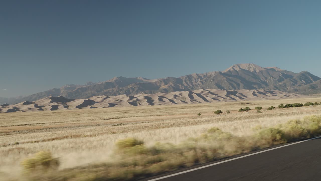 Scenic Landscape with Mountains and Sand Dunes