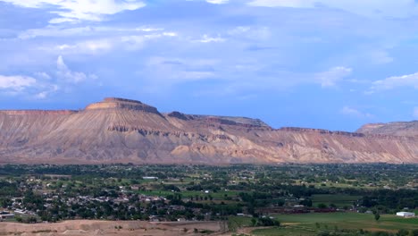 grand junction aerial drone afternoon cloudy grand mesa colorado river summer blue sky wine vineyards parachute fruitvale mt garfield western close delta downtown main street circle left motion