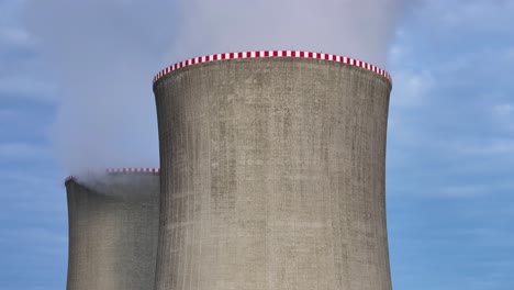 dukovany nuclear power plant cooling towers with red and white safety markings