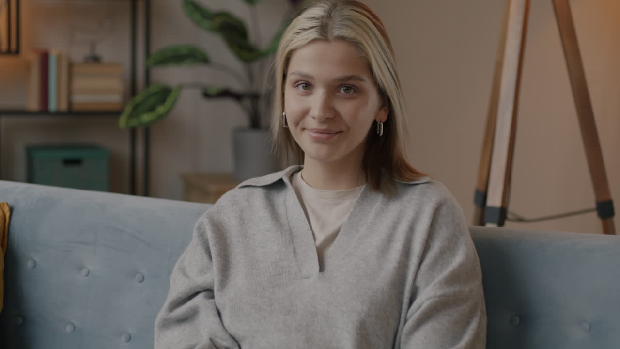 Young woman sitting on a couch