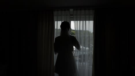 bride getting ready in a hotel room