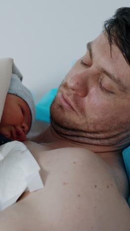newborn baby with father