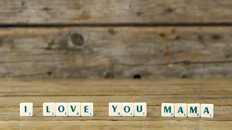 -I-love-you-mama-block-on-wooden-background