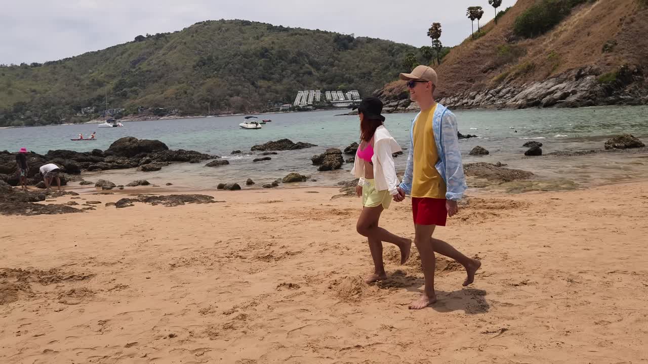 Couple Walking on a Beautiful Beach