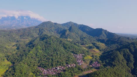 Aerial-view-of-tropical-rural-landscape-against-blue-sky