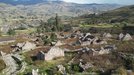 aerial orbits long abandoned stone ruins of uyo uyo site in peru