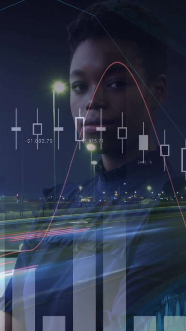 Animation of graph processing data over african american businesswoman in office and city at night