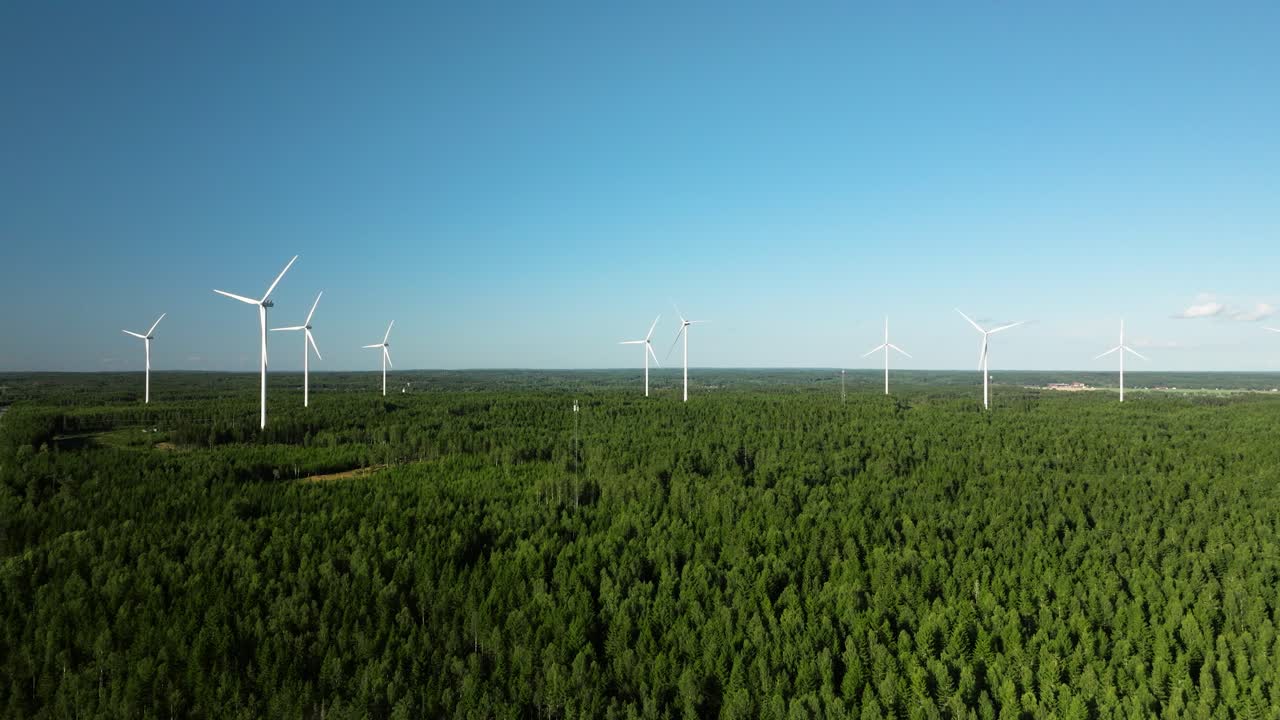 Aerial View of Wind Turbines in a Forest
