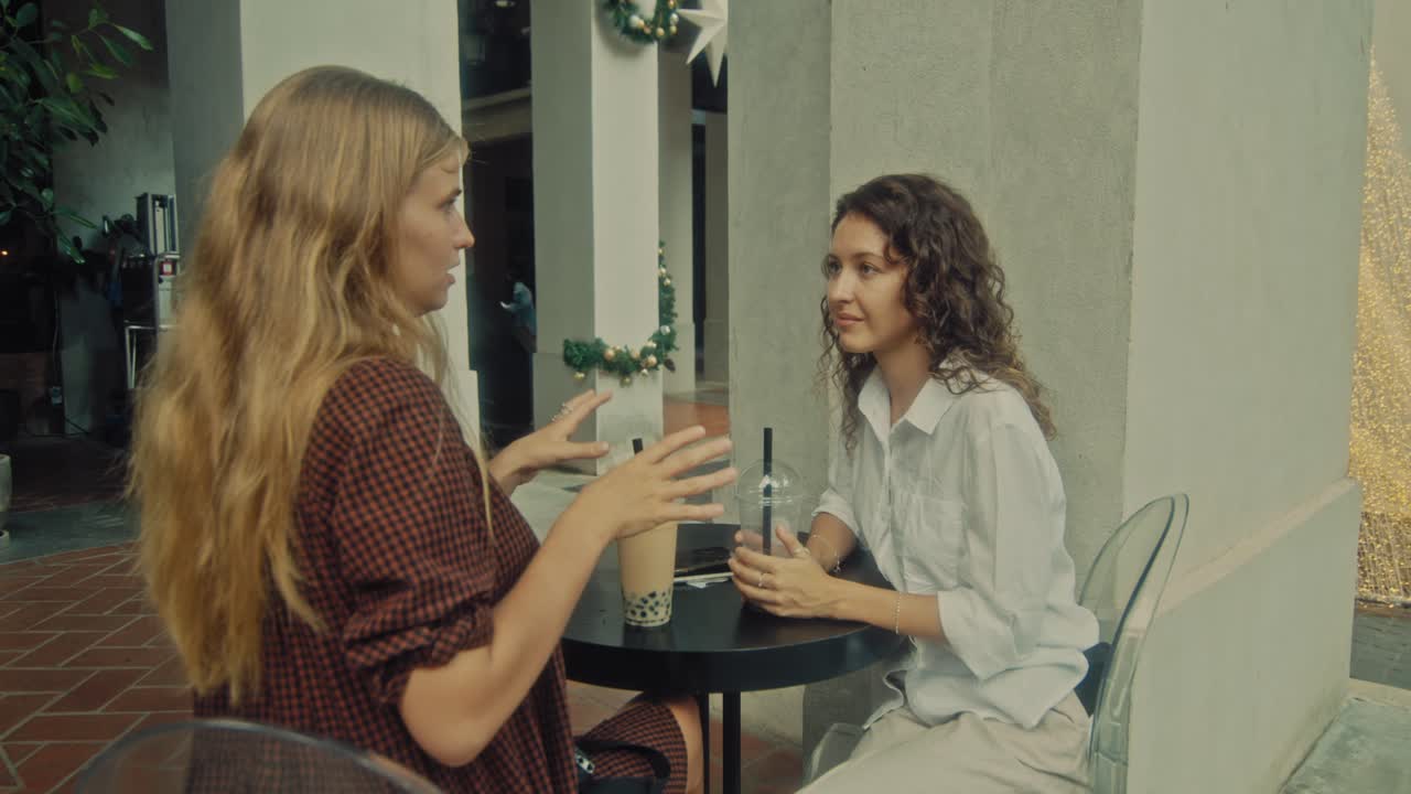 Two Women Friends Enjoying Bubble Tea