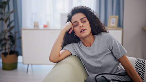 young woman relaxing/sleeping on sofa