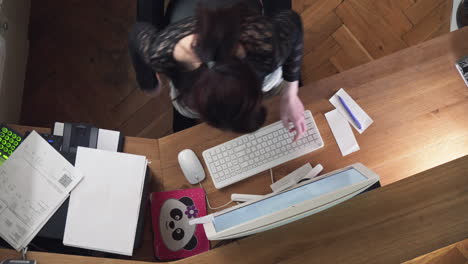 top down view of girl hands, keyboard and mouse, high angle view