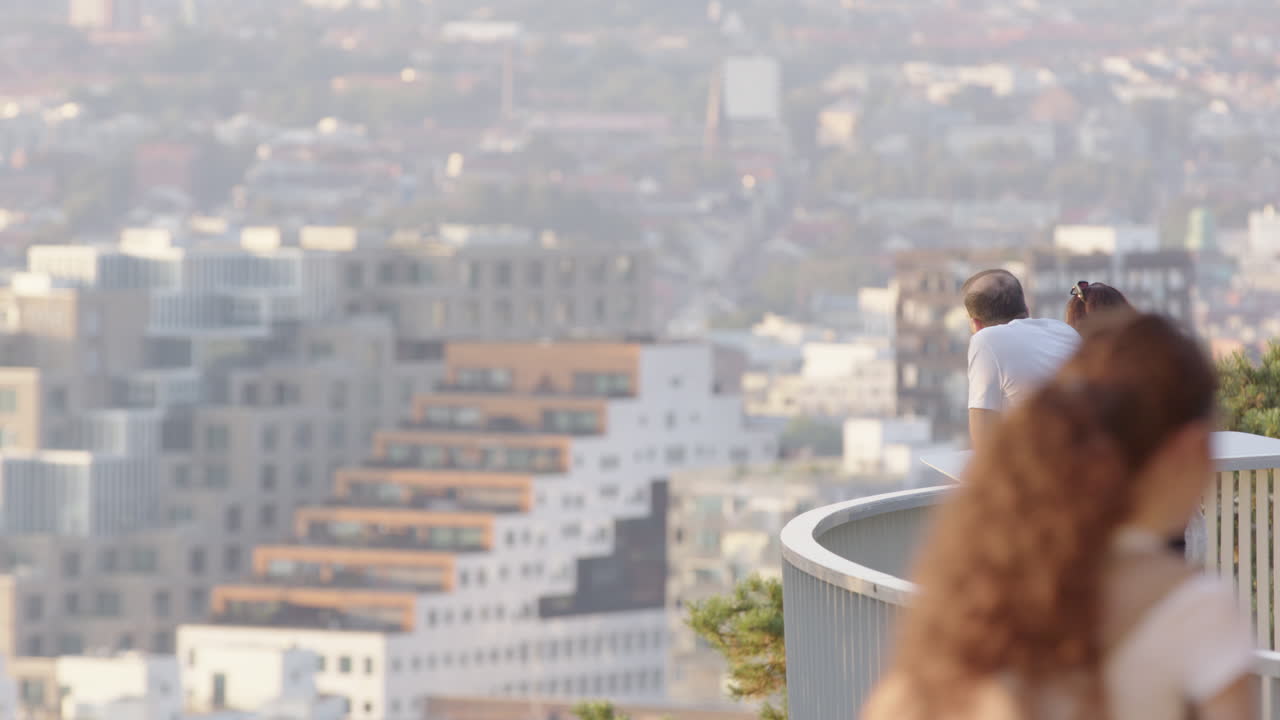 Visitors at Ekeberg Park observation deck enjoy scenic Oslo city views