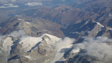 alps mountain view from plane from milan to amsterdam