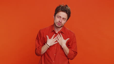 caucasian sad man praying making wish asking hopeful help begging apology meditation imploring