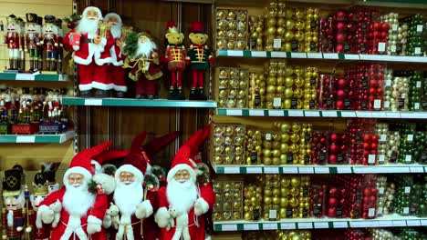 a display of christmas decorations at a uk garden centre hoping to encourage shoppers to buy for christmas