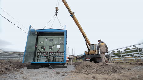 installing electrical equipment at solar farm