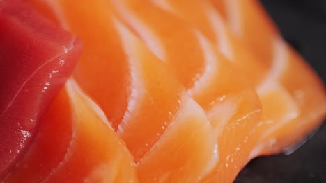 close-up of salmon and tuna sashimi
