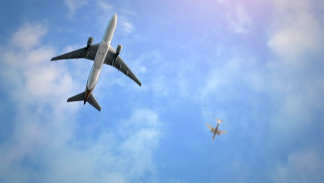 fly airplanes in blue sky with clouds