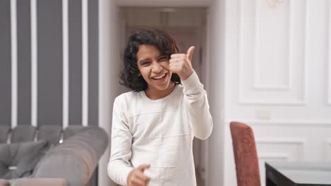 Energetic-Indian-kid-boy-showing-thumbs-up