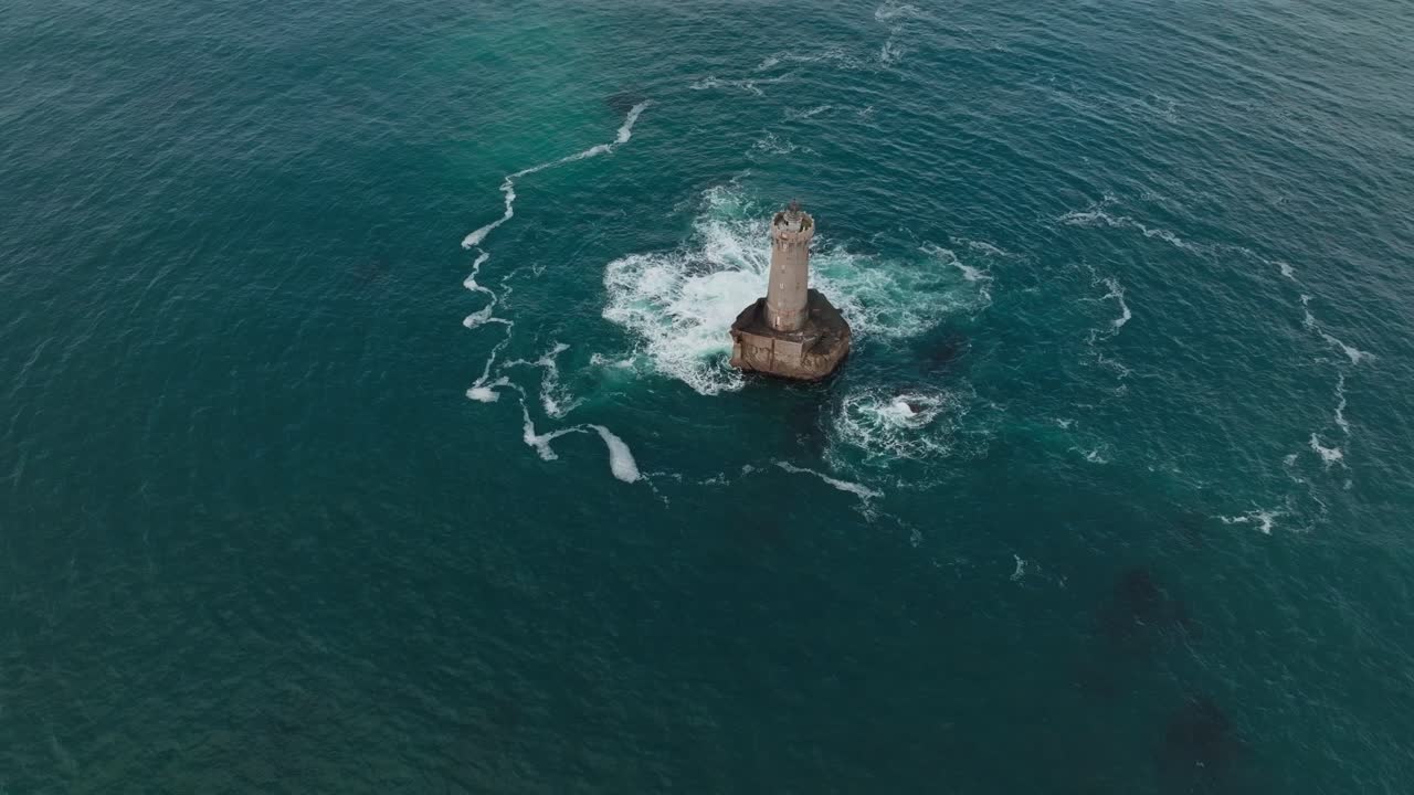 A reverse panning shot of Phare du Four a lighthouse in Bretagne France
