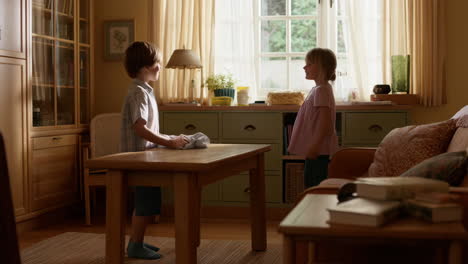 children cleaning up at home
