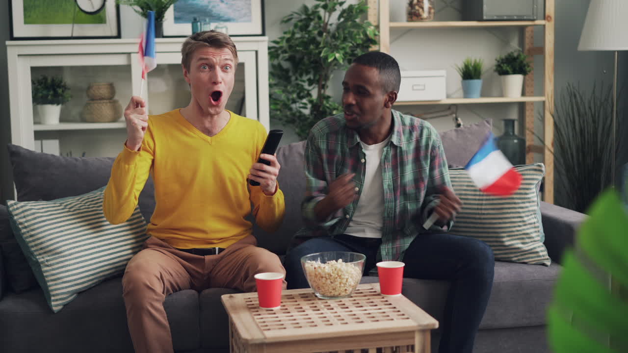 Friends watching a football match