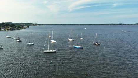 High-angle-shot-of-anchored-sailboats-in-Muskegon-Lake