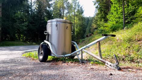 milk container on wheels on a roadside