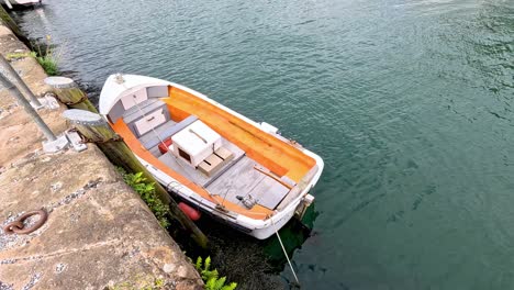 a boat is tied to the dock