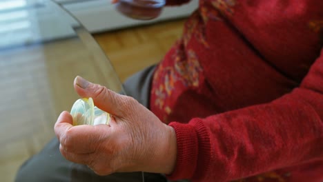 senior woman having medicine