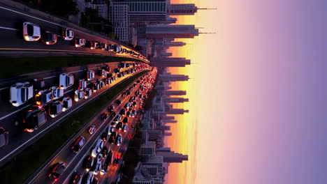 busy highway traffic and city skyline at twilight