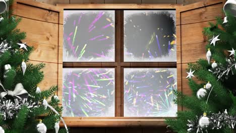 animación digital del árbol de navidad y el marco de la ventana de madera contra los fuegos artificiales que explotan