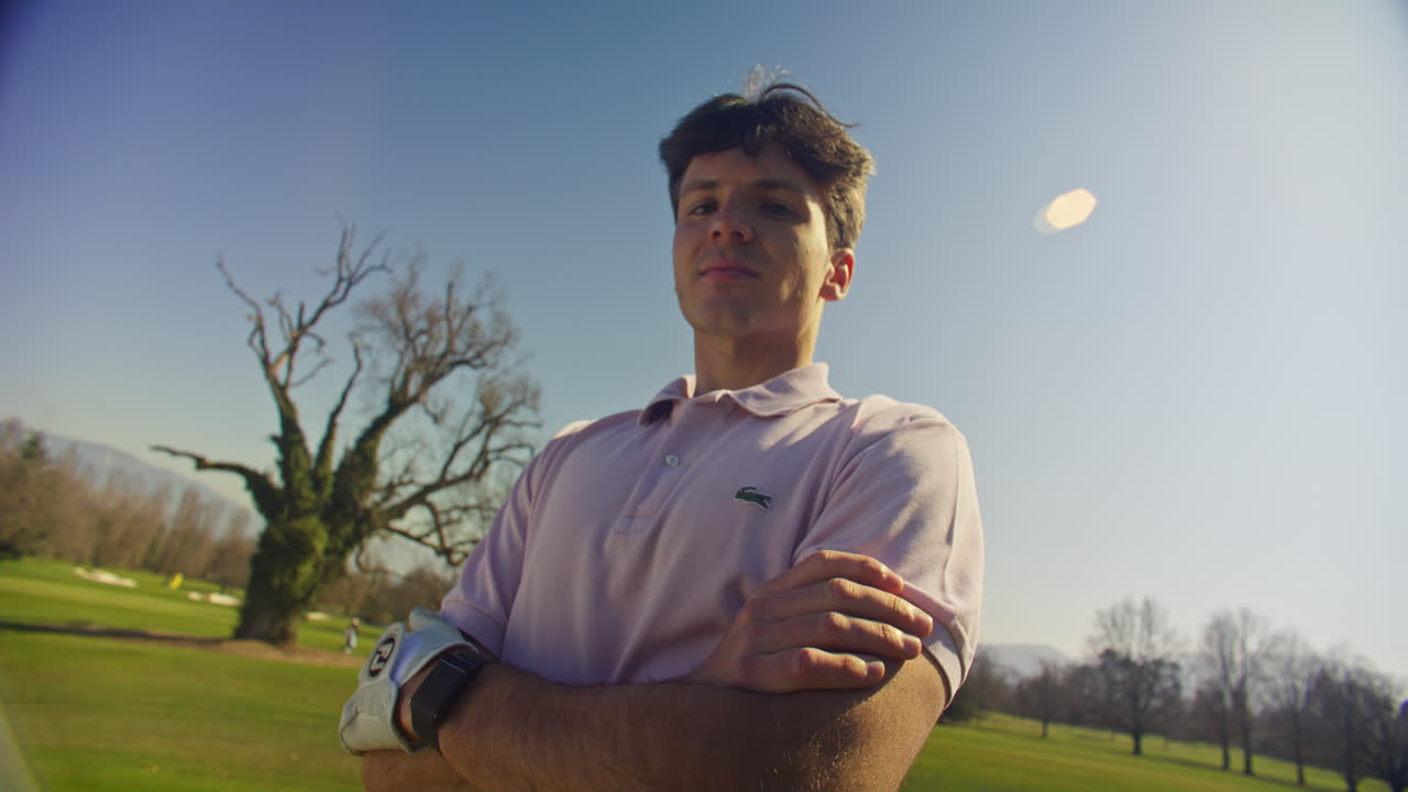Young golfer playing on a sunny spring day in Switzerland, showcasing precise chipping, putting, bunker, and approach shots. Perfect for sports, lifestyle, and outdoor themes.