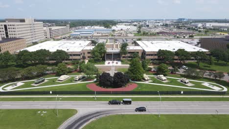 Aerial-Ascending-backwards-shot-from-the-Detroit-Arsenal,-built-tanks-and-armored-vehicles-in-Warren-Michigan,-USA