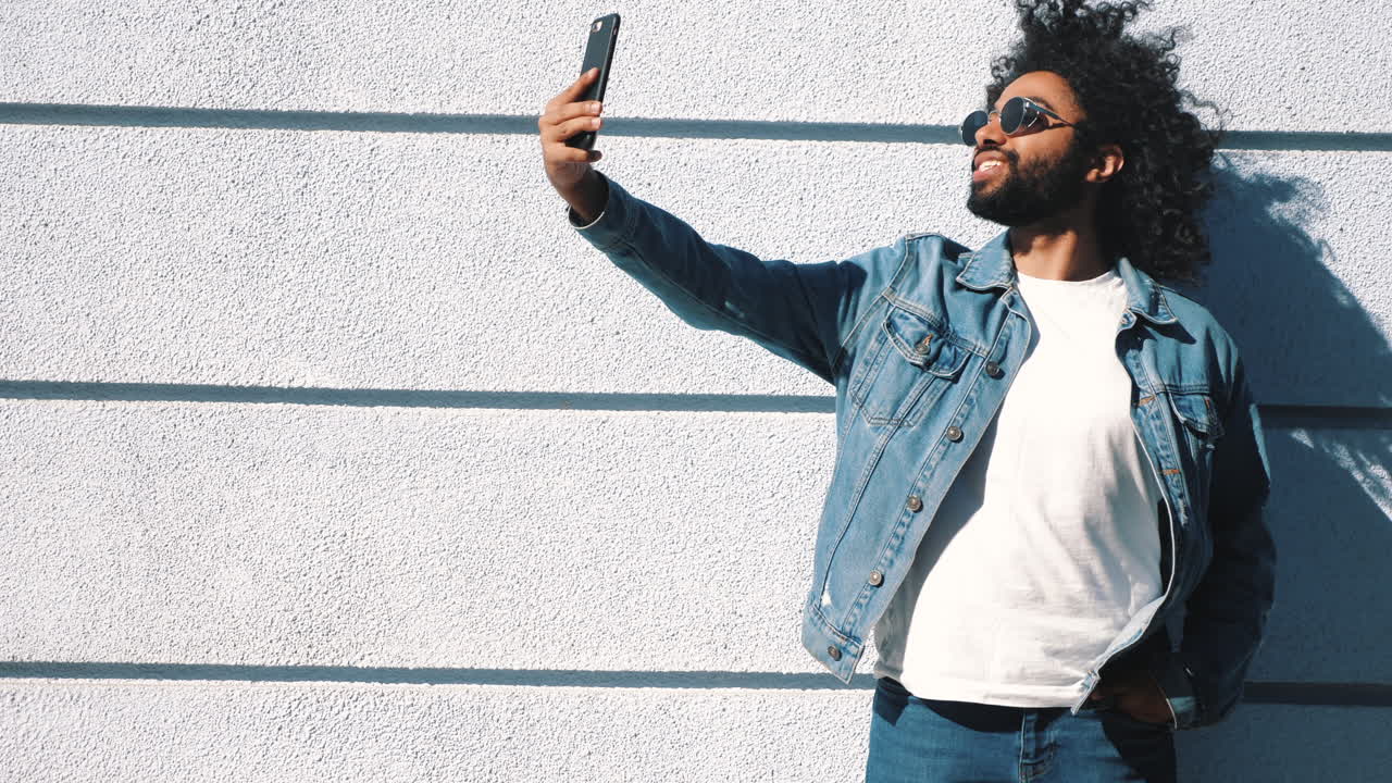 Man taking a selfie outdoors